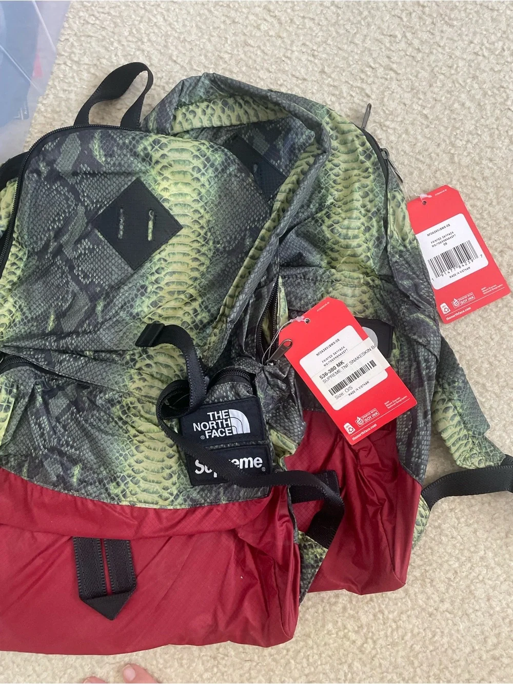 The North Face Green Snakeskin & Red Colorblock Backpack